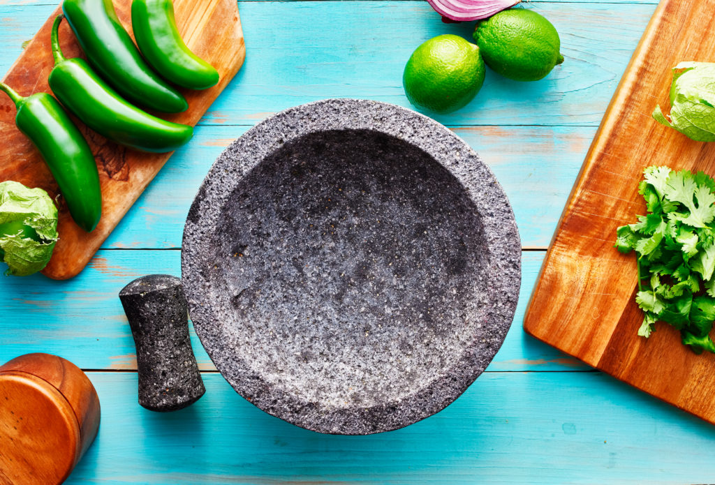 Mexican molcajete utensil made or volcanic rock