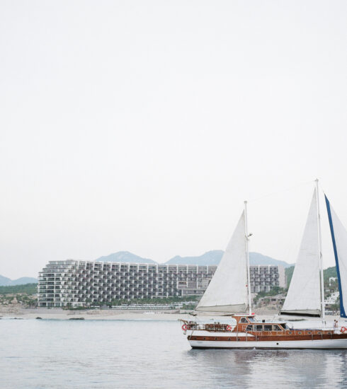 Sailboat wedding experience in front of Grand Velas Los Cabos